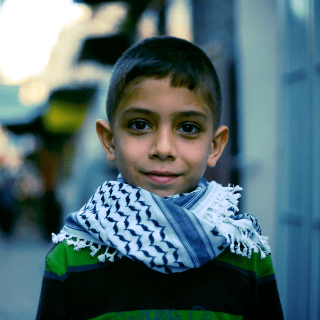Kid wearing a Keffiyeh – Kufiya Corner